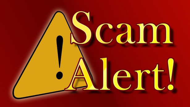 Scam Alert! Yellow warning triangle on a red gradient background.