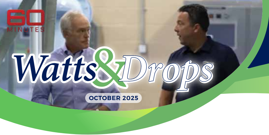 Two men in an industrial setting talk together beneath the Watts & Drops banner/logo.